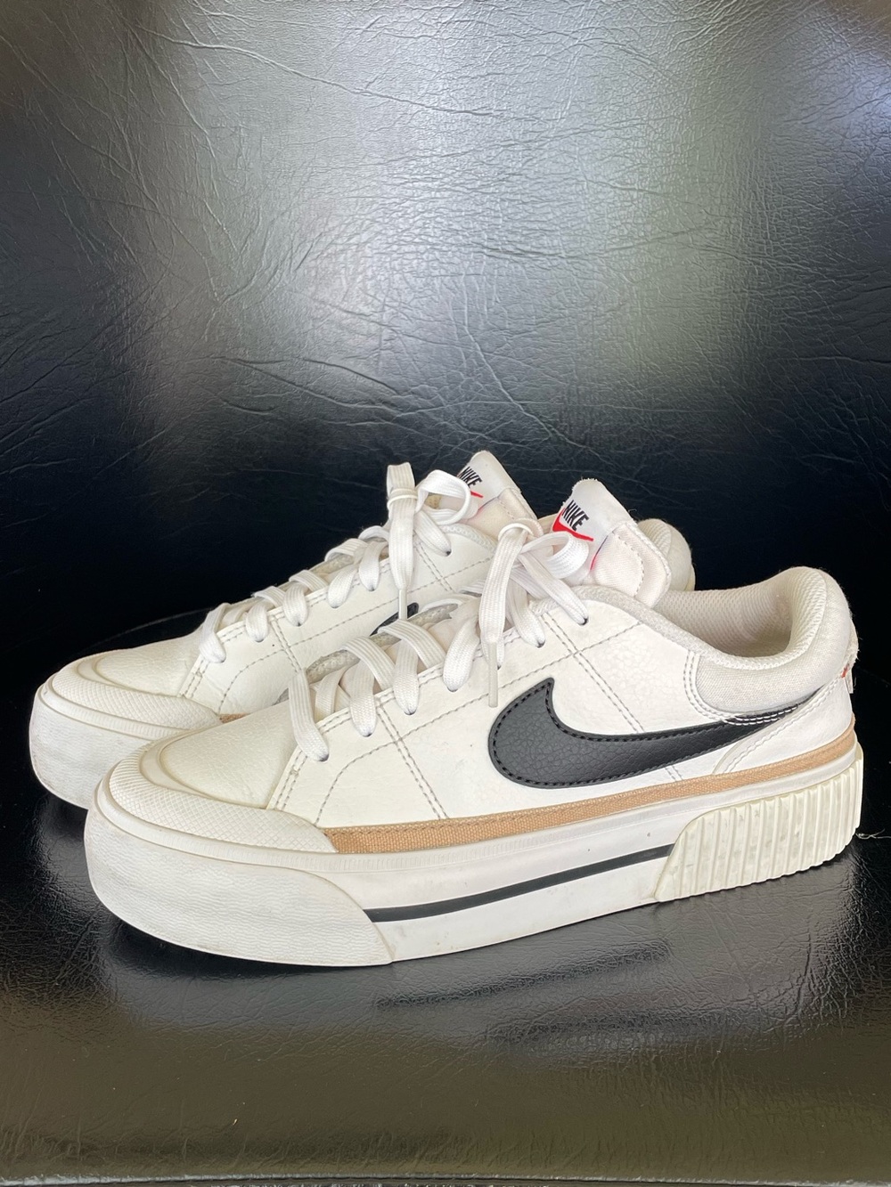 Nike Women’s White Sneakers with Black Swoosh and Tan Accent